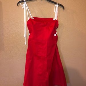 Brand new red dress with “shoe lace” straps